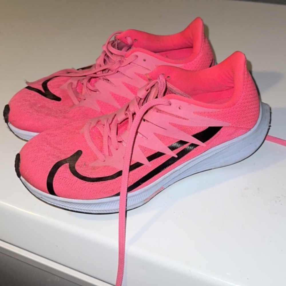 Bright pink Nike shoes